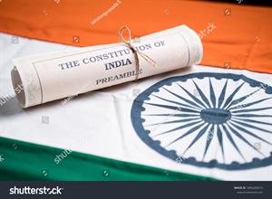 stock-photo-selective-focus-on-flag-indian-constitution-or-bharatiya-savidhana-preamble-old-scattered-text-1896280519.jpg