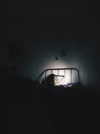 pillow-on-bed-in-a-dark-room.jpg